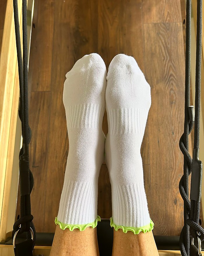 Fresh Meadow Pilates grip socks, the silicone heart grip sole in use