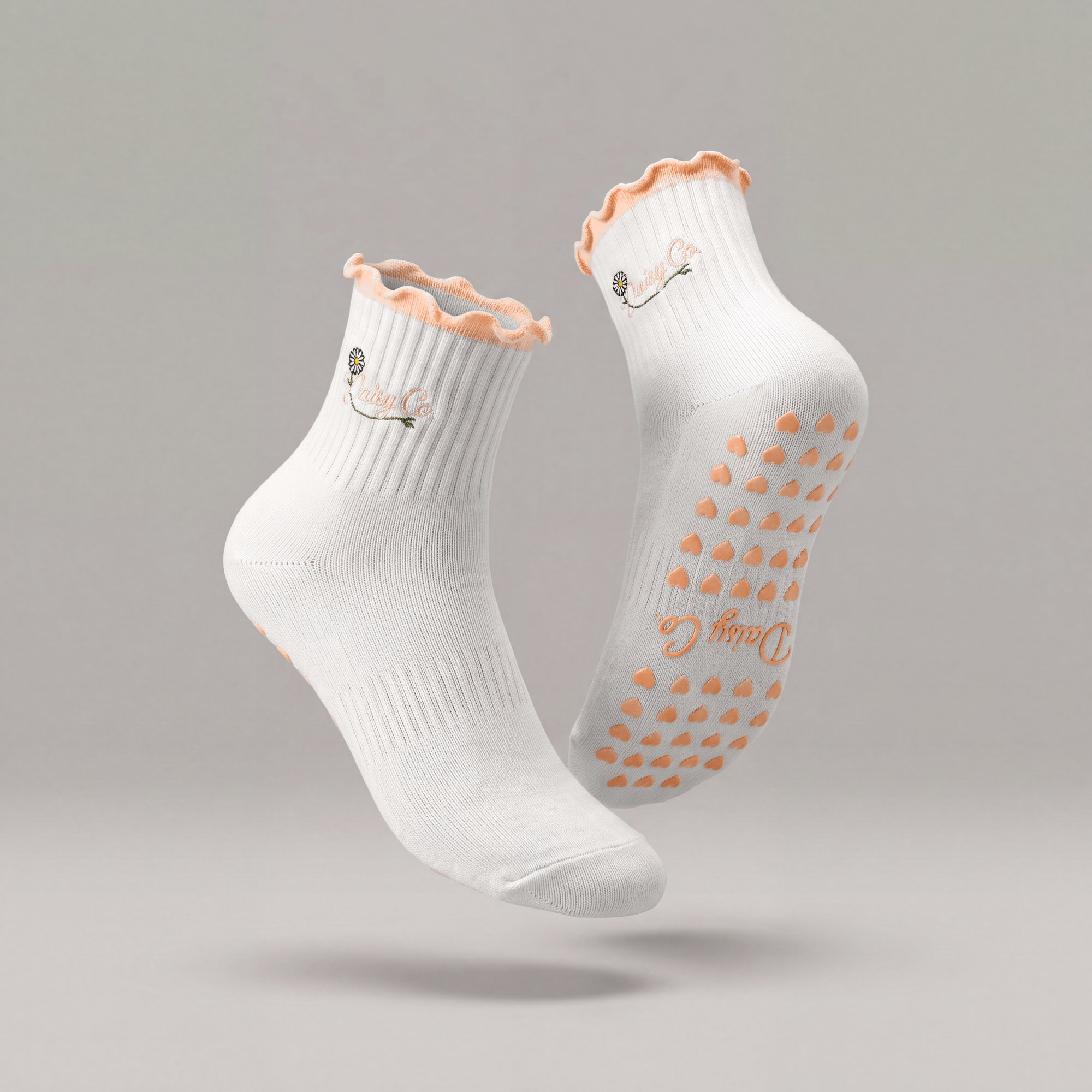 Coral Kiss pilates grip socks by Daisy Co.