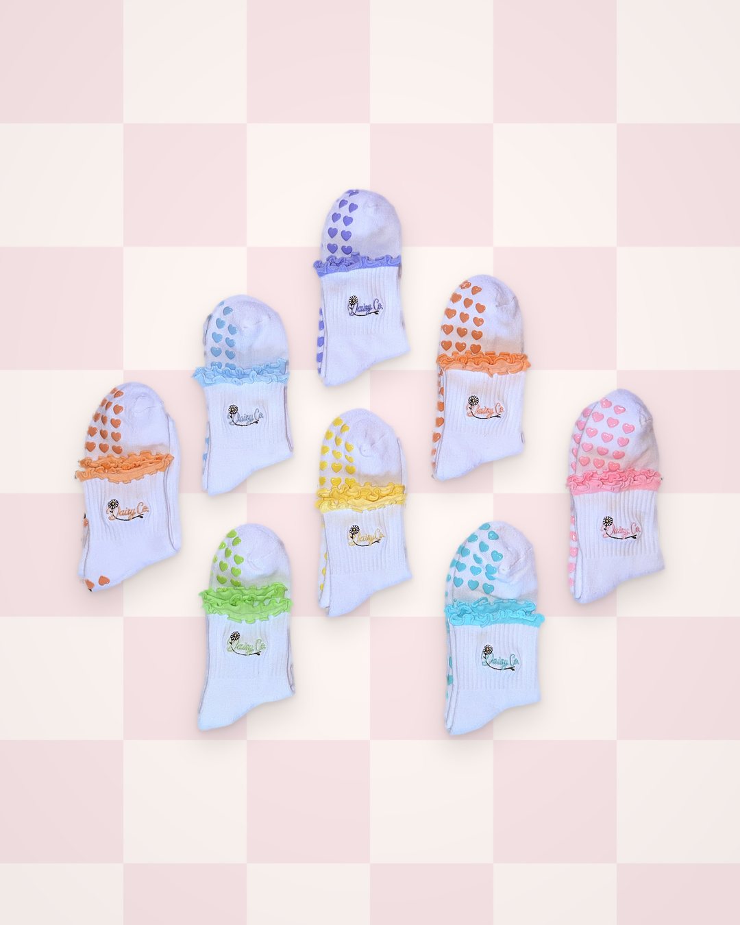 The colourways laid out together on a blush check