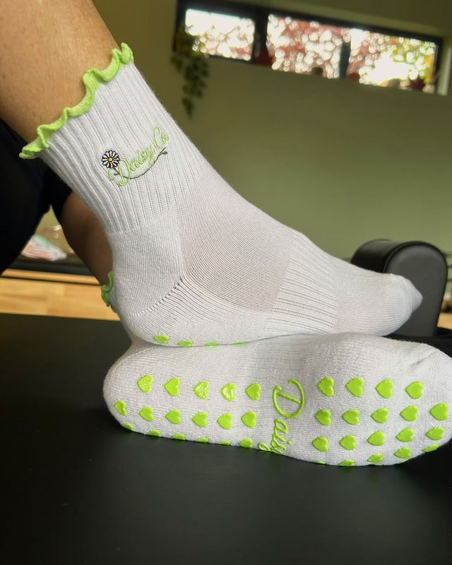 The silicone heart grip across a Fresh Meadow sole